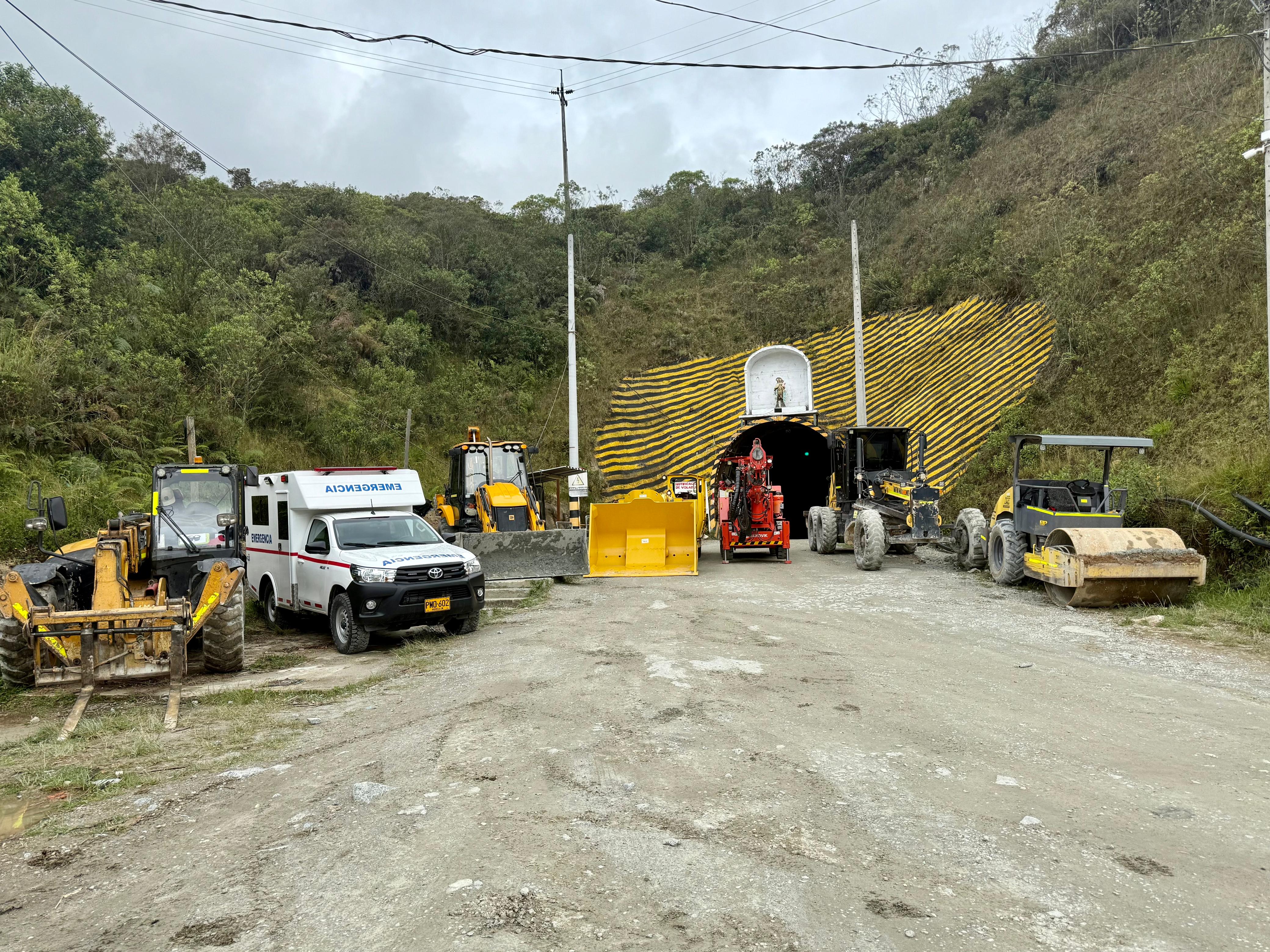 San Ramón mine portal with vehicles and equipment